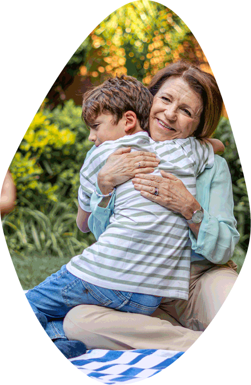 woman hugging grandson