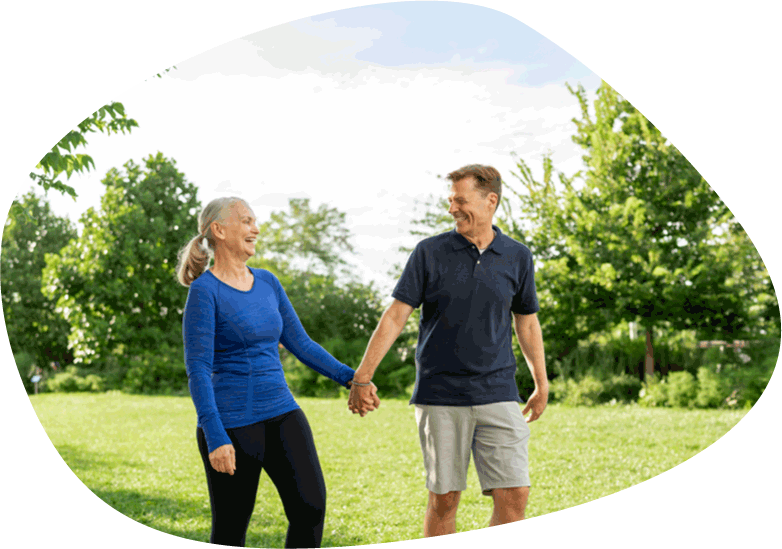 couple holding hands and walking