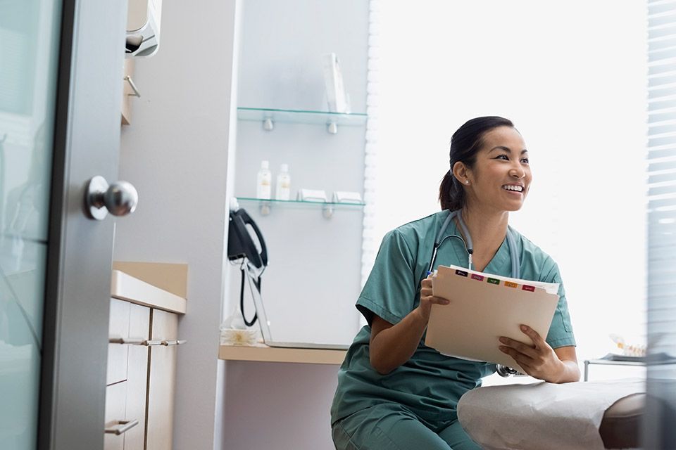 Healthcare worker with clipboard